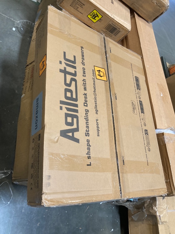 Photo 1 of ** NEW ** Agilestic L Shaped Electric Standing Desk with 2 Drawers, 63 Inch Ergonomic Adjustable Height Desk with Storage, Corner Desk Sit Stand up Computer Table for Work Office Home, Rustic Brown