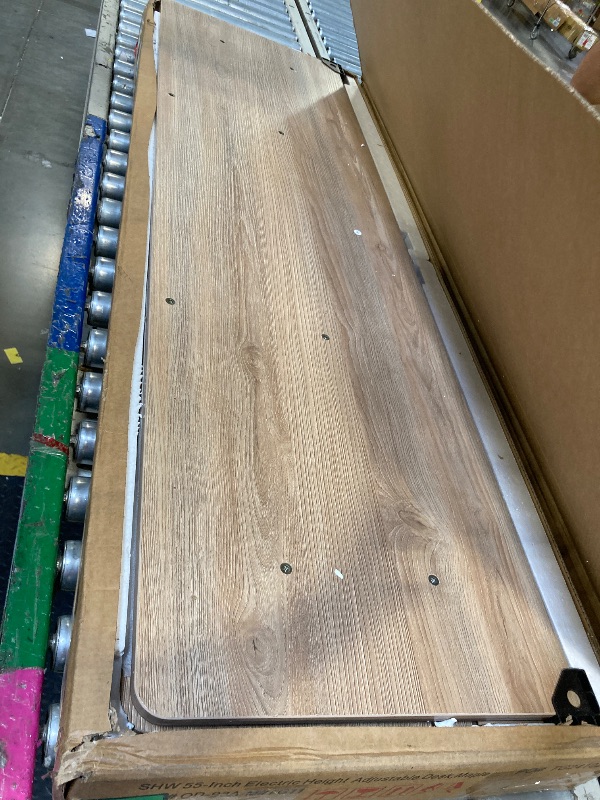 Photo 1 of ** BRAND NEW ITEM ** SHW 55 x 28 Inches Electric Height Adjustable Standing Desk with Drawer and Memory Preset, Maple