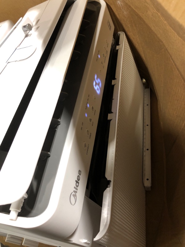 Photo 1 of ** VERY USED / TURN ON / MISSING CONTROL AND ACCESSORIES  ** Midea 8,000 BTU U Shaped Smart Inverter Window Air Conditioner - Cools 350 Sq Ft, Ultra Quiet with Open Window Flexibility - Alexa/Google Assistant Compatible - 37% Energy Savings, Remote (Updat