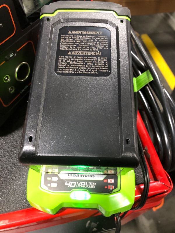 Photo 1 of ** VERY USED / THE BATTERY TURNS ON ** Greenworks 40V 21" Brushless Cordless (Self-Propelled) Lawn Mower (75+ Compatible Tools), 5.0Ah Battery and Charger Included