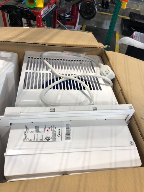 Photo 1 of ****** BOX DOES NOT MATCH ******* Midea 12,000 BTU EasyCool Window Air Conditioner, Dehumidifier and Fan - Cool, Circulate and Dehumidify up to 550 Sq. Ft., Reusable Filter, Remote Control