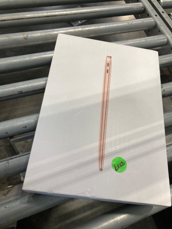 Photo 1 of ****WITHOUT CHARGER***2020 Apple MacBook Air Laptop: Apple M1 Chip, 13” Retina Display, 8GB RAM, 256GB SSD Storage, Backlit Keyboard, FaceTime HD Camera, Touch ID. Works with iPhone/iPad; Gold
