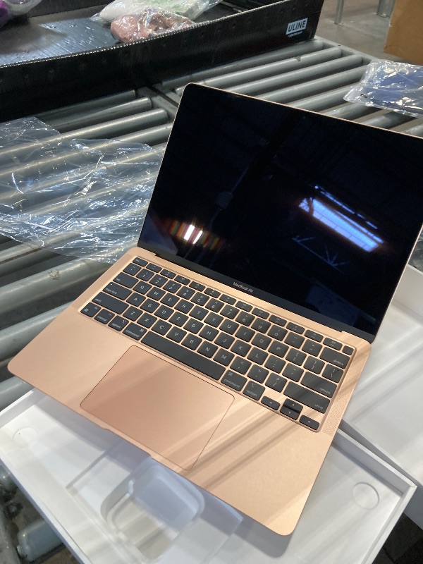 Photo 1 of ****WITHOUT CHARGER***2020 Apple MacBook Air Laptop: Apple M1 Chip, 13” Retina Display, 8GB RAM, 256GB SSD Storage, Backlit Keyboard, FaceTime HD Camera, Touch ID. Works with iPhone/iPad; Gold