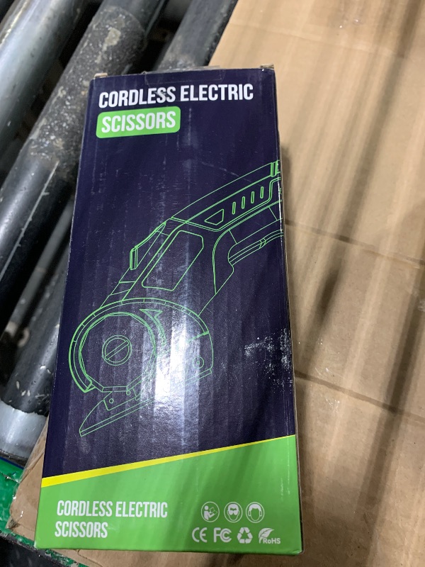 Photo 1 of **DOES NOT HOLD CHARGE** Cordless Electric Scissors: 4V Rechargeable Rotary Cardboard Cutter, 3000mAh Battery, with LED Light, 2 Blades, Box Cutter for Fabric Carpet Carton Plastic Leather Cloth