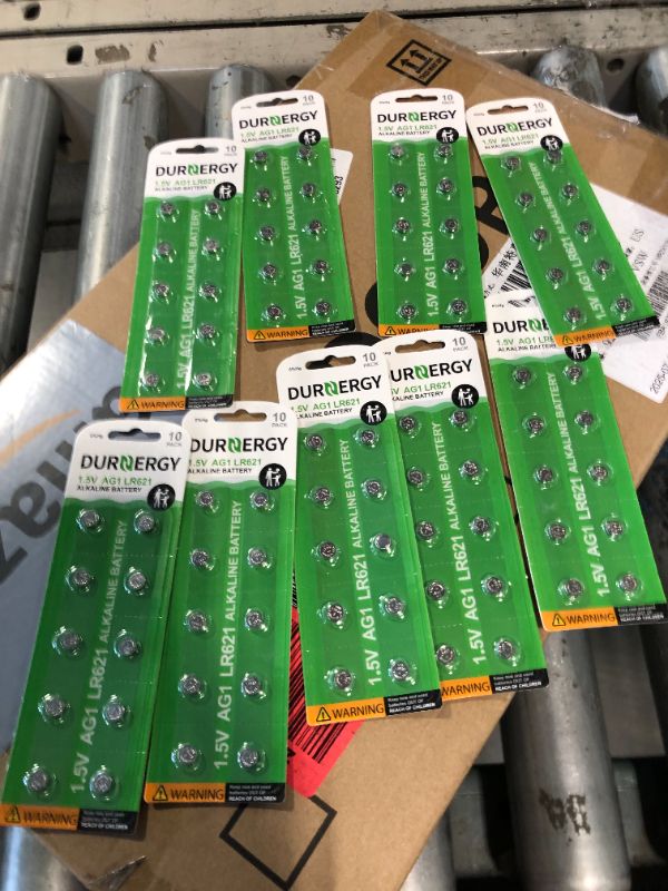 Photo 1 of ****MISSING 1 PACK****DURNERGY SR621SW Watch Battery 100 Pcs, AG1 Battery Watch Batteries 364 363, Alkaline Coin Button Cell Battery, LR621 Green Battery