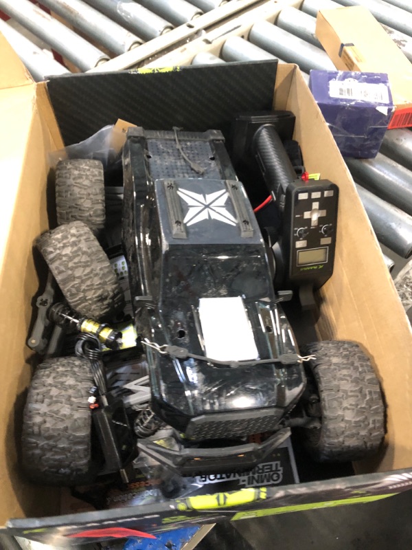 Photo 1 of ** very used / mssing parts *** RIAARIO 1/10 Brushless RC Cars, Monster Truck, 50+ MPH, 4WD, Waterproof, Carbon Fiber, Black, Ages 8+