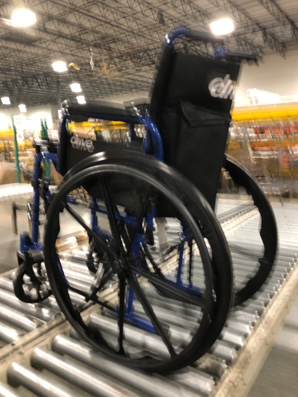 Photo 1 of ** VERY USED / MISSING PARTS *** Drive Medical BLS18FBD-ELR Blue Streak Lightweight Wheelchair with Swing-Away Elevating Leg Rests and Flip-Back Arms