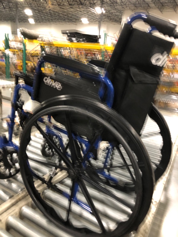 Photo 1 of ** VERY USED / MISSING PARTS *** Drive Medical BLS18FBD-ELR Blue Streak Lightweight Wheelchair with Swing-Away Elevating Leg Rests and Flip-Back Arms