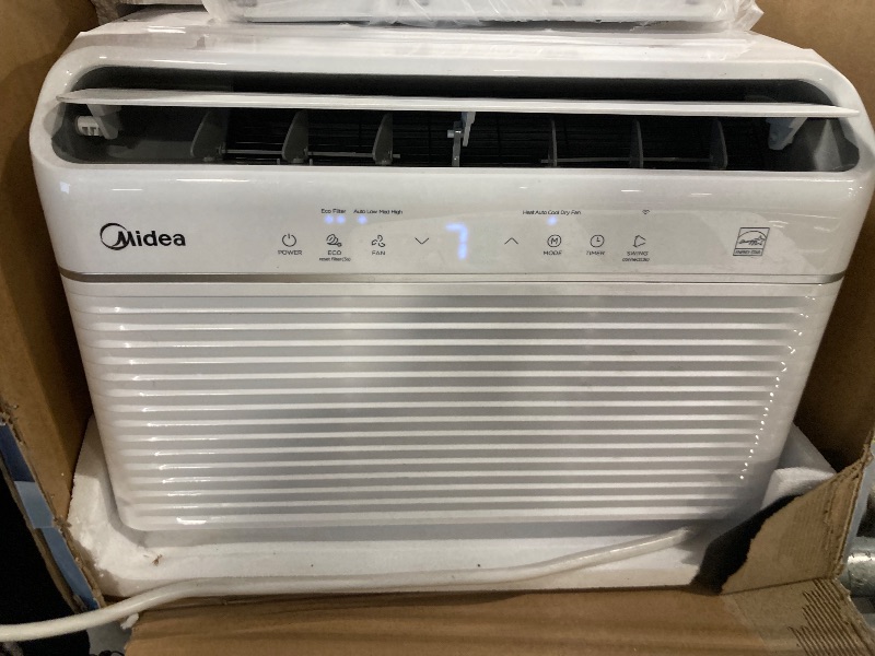 Photo 1 of **********working good********* Midea 12,000 BTU Smart Inverter Air Conditioner Window Unit with Heat and Dehumidifier – Cools up to 550 Sq. Ft., Energy Star Rated, Quiet Operation, Electronic Controls, Remote Control, White