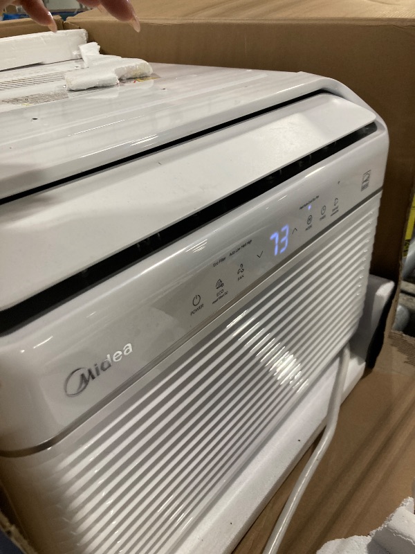 Photo 1 of **********working good********* Midea 12,000 BTU Smart Inverter Air Conditioner Window Unit with Heat and Dehumidifier – Cools up to 550 Sq. Ft., Energy Star Rated, Quiet Operation, Electronic Controls, Remote Control, White