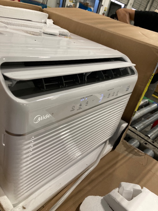 Photo 1 of **********working good********* Midea 12,000 BTU Smart Inverter Air Conditioner Window Unit with Heat and Dehumidifier – Cools up to 550 Sq. Ft., Energy Star Rated, Quiet Operation, Electronic Controls, Remote Control, White