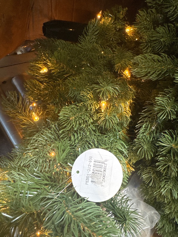 Photo 1 of *****LIGHTS UP PERFECTLY******* National Tree Company Pre-lit 'Feel Real' Artificial Giant Downswept Christmas Tree, Green, Douglas Fir, White Lights, Includes Stand, 10 feet