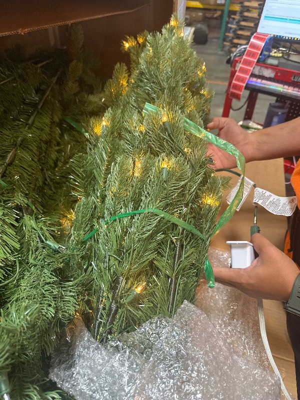 Photo 1 of *****LIGHTS UP PERFECTLY******* National Tree Company Pre-lit 'Feel Real' Artificial Giant Downswept Christmas Tree, Green, Douglas Fir, White Lights, Includes Stand, 10 feet