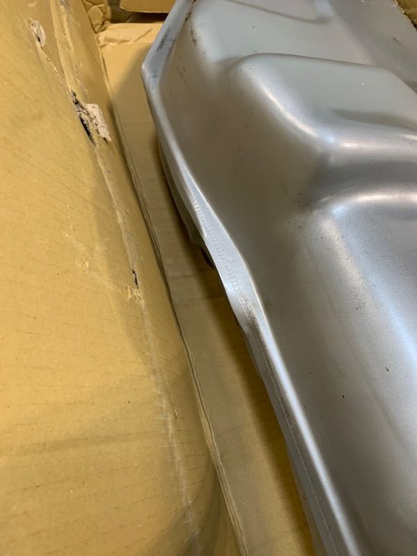 Photo 1 of **DENTS ALONG THE MIDDLE**Spectra Premium F45B Fuel Tank