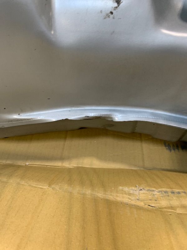 Photo 1 of **DENTS ALONG THE MIDDLE**Spectra Premium F45B Fuel Tank