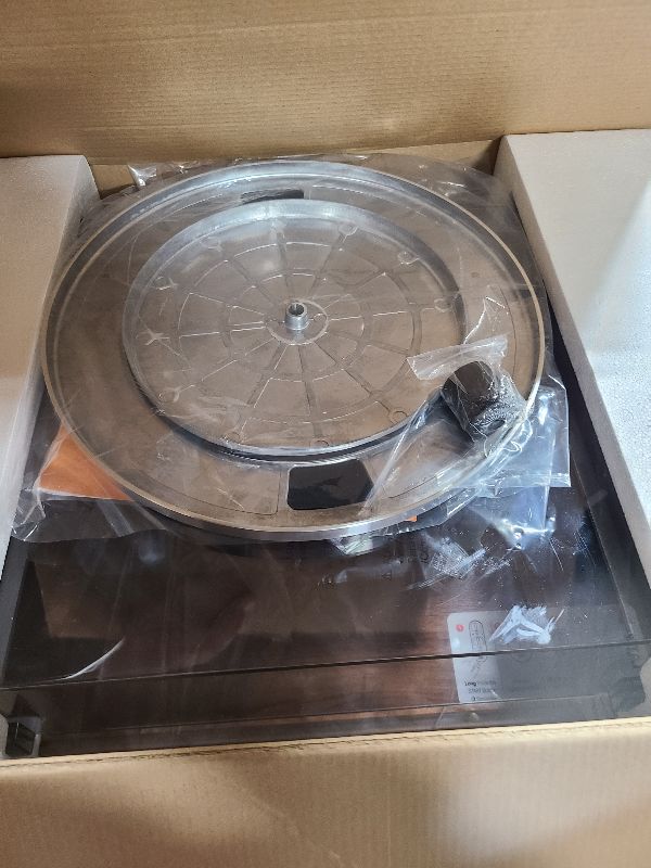 Photo 1 of 1 by ONE High Fidelity Belt Drive Turntable with Built-in Speakers, Vinyl Record Player with Magnetic Cartridge, Bluetooth Playback and Aux-in Functionality, Auto Off