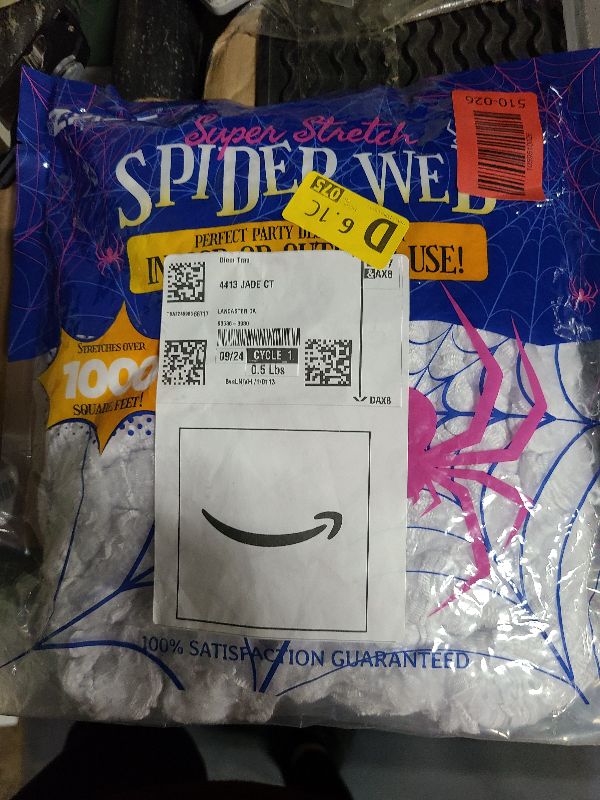 Photo 1 of 1000 sqft Spider Webs Halloween Decorations Bonus with 30 Fake Spiders, Super Stretch Cobwebs for Halloween Indoor and Outdoor Party Supplies