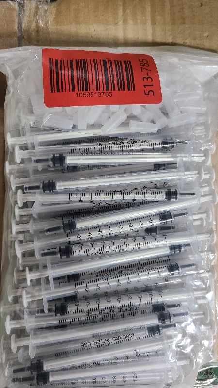 Photo 1 of 100 Pack 1ml Syringe with Cap for Liquid, 1cc Plastic Small Syringes with Cover, Non-Sterile, No Needle