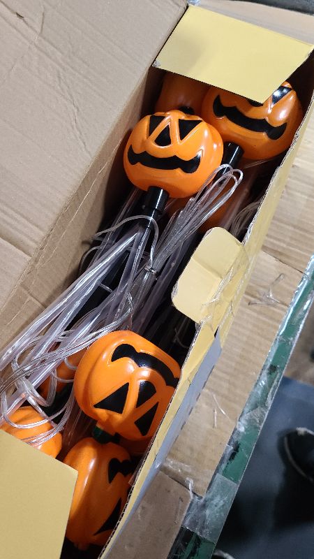 Photo 1 of 12 Pack Solar Pumpkin Lights for Halloween Decorations Outdoor, Waterproof Halloween Pathway Lights with 8 Modes, Orange Purple and Green Halloween Walkway Stake Lights for Yard Garden Party Decor