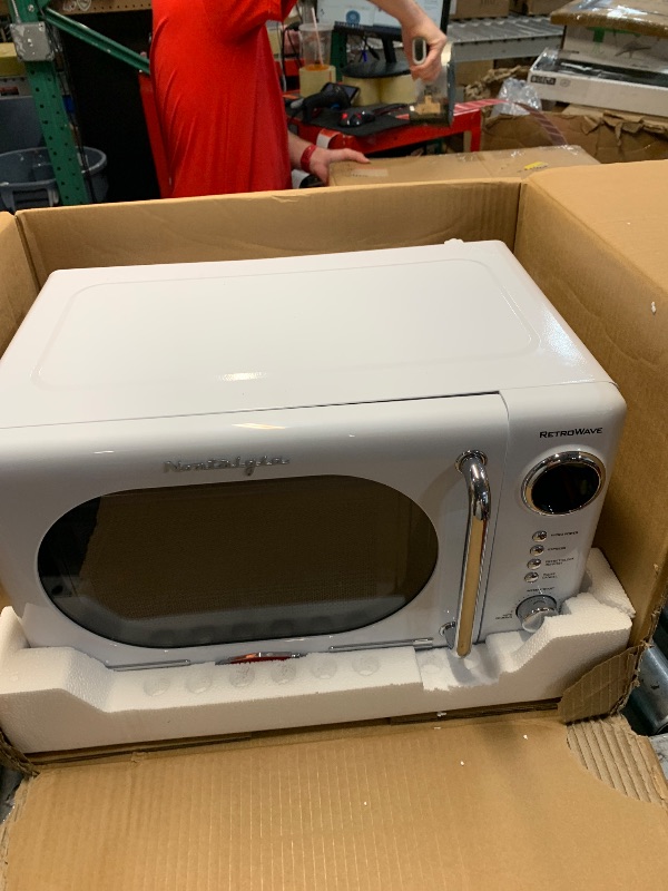 Photo 1 of ***FOR PARTS ONLY ***MAJOR DAMAGE***
Nostalgia Retro Compact Countertop Microwave Oven - 0.7 Cu. Ft. - 700-Watts with LED Digital Display - Child Lock - Easy Clean Interior - White
