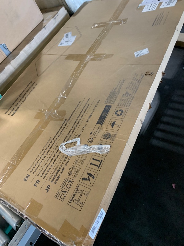 Photo 1 of ***********THIS DOES NOT INCLUDE THE DESK LEGS, THE TOP IS ALSO CRACKED*************
Marsail 55 x 30 Electric Standing Desk with One-Piece Desktop, Sit Stand Desk with Thickened Tabletop, Height Adjustable Stand Up Desk with Cable Management for Home Offi