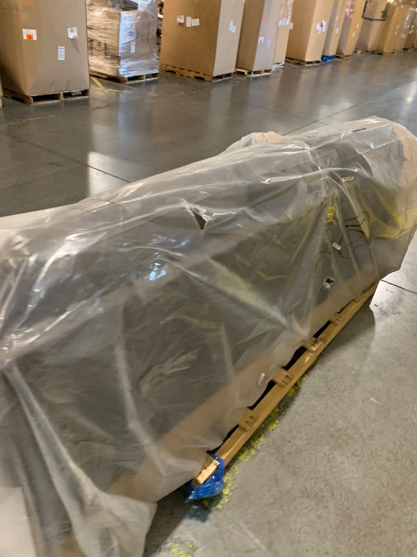Photo 1 of ***PALLET TRUCK OR TRAILER PICKUP ONLY***
Signature Design by Ashley Maderla Faux Leather Oversized Sofa, Walnut Brown