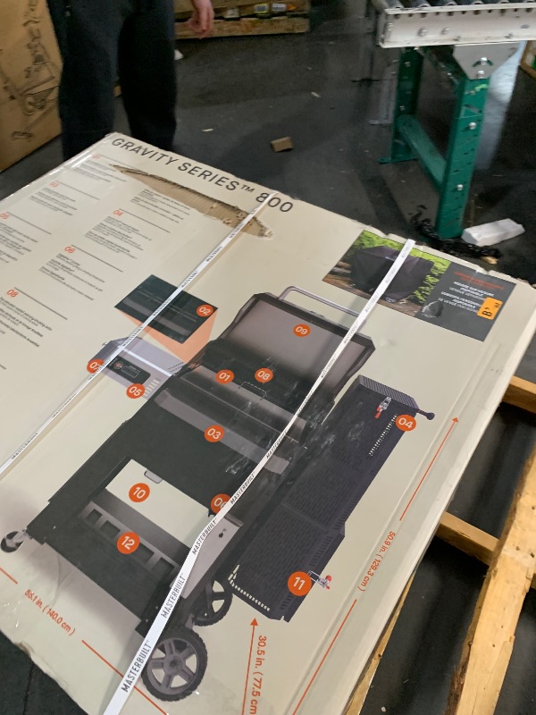Photo 1 of ***FACTORY SEALED***
Masterbuilt® Gravity Series® 800 Digital Charcoal Grill, Griddle and Smoker with Digital Control, App Connectivity and 800 Cooking Square Inches in Black, Model MB20040221