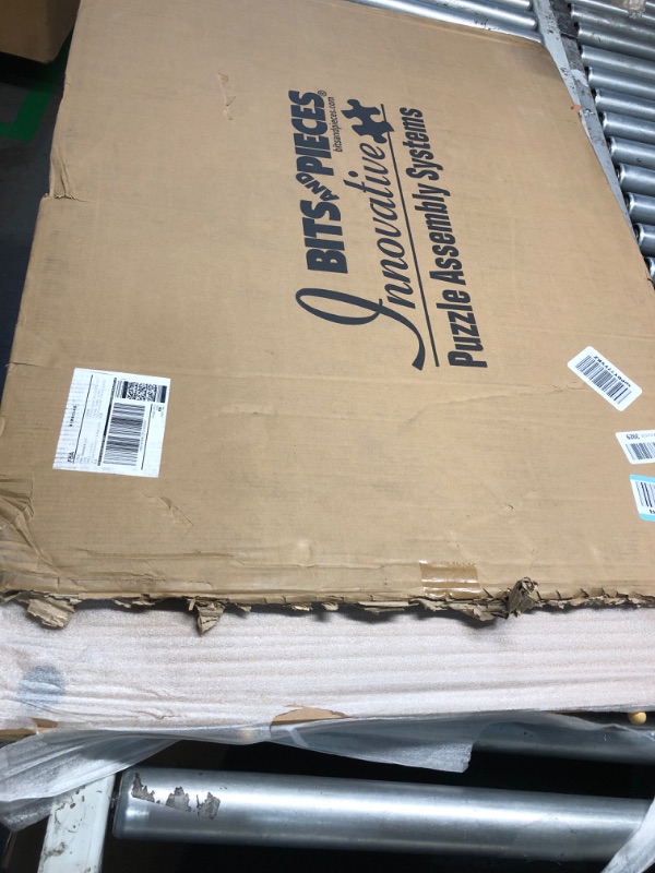 Photo 1 of Bits and Pieces Puzzle Board with Drawers – 1500 Piece Jigsaw Puzzle Table Organizer – Premium Wooden Puzzle Board for Adults, 26"x35" Smooth Non-Slip Surface, Portable Puzzle Table with Sorting Trays