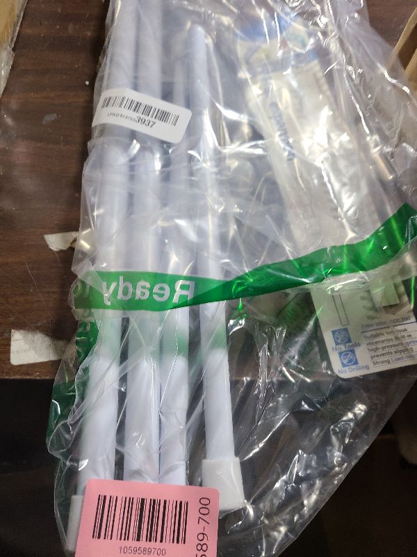 Photo 1 of 2 Pack Small Tension Rods 26 in to 39 Curtain Rods Window Rods in Extendable Width Spring Cupboard Bars for Kitchen Utensils, Closet, and Cabinet, Fit in The Spaces to Stay Up 26 to 39 in