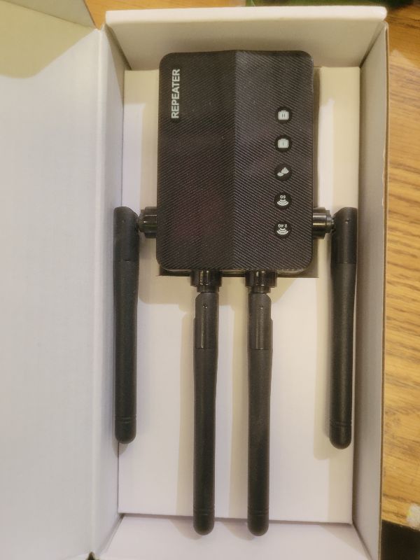 Photo 1 of 12880 Sq.Ft WiFi Extender Signal Booster, 1200Mbps WiFi Repeater, 105-Device Support, Simple Install, WiFi Extender with Wide Compatibility