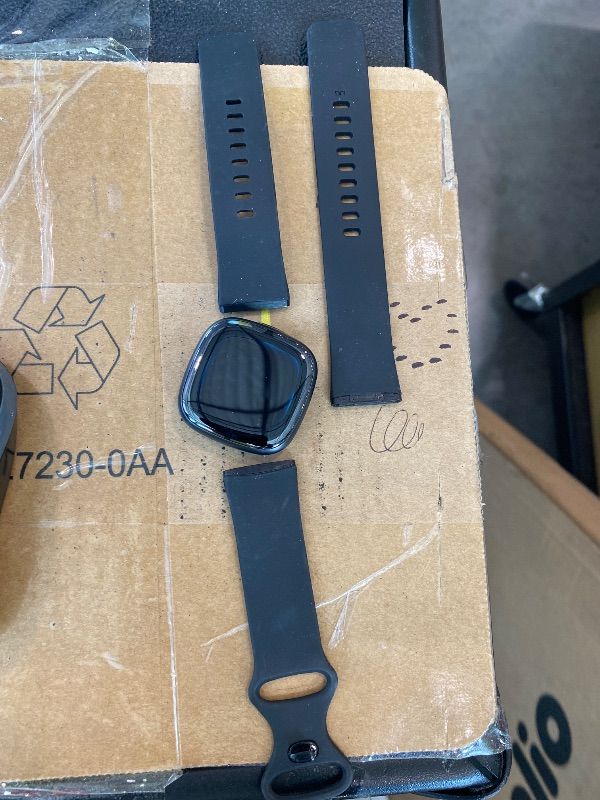 Photo 1 of *See Clerk Notes* Fitbit Sense 2 Advanced Health and Fitness Smart Watch (Grey/Graphite) with Manage Stress, ECG, SpO2, GPS, 2 Sizes Bands, Bundle with Charger Dock, Wall Adapter, 2 Screen Protectors & PremGear Cloth
**USED**