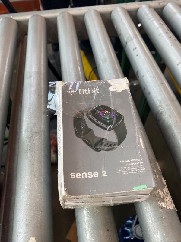 Photo 1 of *See Clerk Notes* Fitbit Sense 2 Advanced Health and Fitness Smart Watch (Grey/Graphite) with Manage Stress, ECG, SpO2, GPS, 2 Sizes Bands, Bundle with Charger Dock, Wall Adapter, 2 Screen Protectors & PremGear Cloth
**USED**