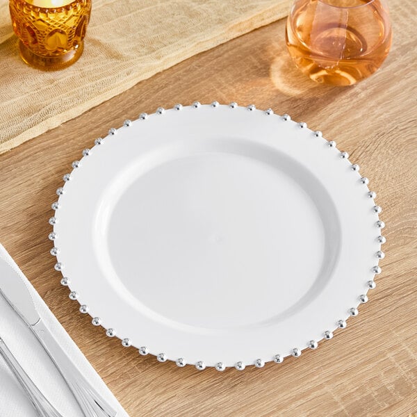 Photo 1 of White and Silver Plastic Plates with Disposable Silverware for Guests,White Plastic Plates Set Include Dinner Plate, Dessert Plate, Cutlery for Wedding & Party