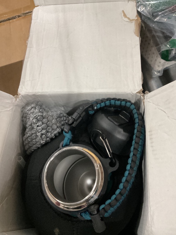 Photo 1 of 1 Gallon Water Bottle Stainless Steel - 128oz Insulated Flask Water Bottle with Sleeve Strap, Big Water Jug with Straw & Spout Lid, Gym Camping Gallon Water Bottle w/Paracord Handle, protective Boot