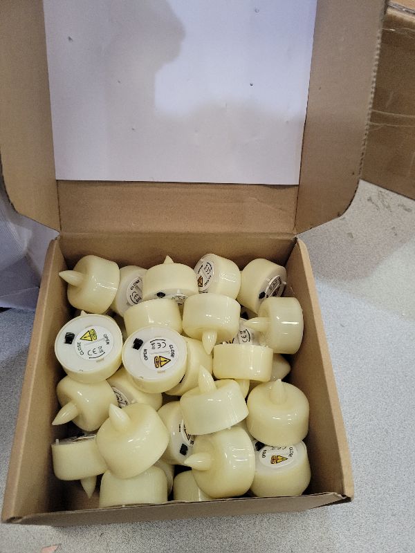 Photo 1 of Amagic 150 Pack Flameless LED Tea Lights Candles Battery Operated, Electric Fake Tealight Candles for Votive, Halloween, Christmas, Home Decor, Wedding, Table Decor (150Pack)