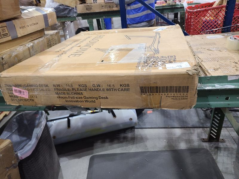 Photo 1 of 
HLONONE Gaming Table, 140 x 70 cm, Ergonomic Computer Desk Made of Carbon Fibre, Robust and Stable Gaming Desk, PC Table with Headphone Hooks and Drink Holder, Black 