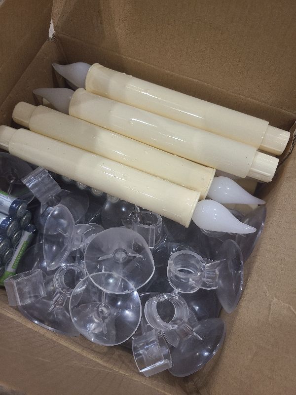 Photo 1 of 12 Pack Battery Operated Window Candles with Sensor Dusk to Dawn, Ivory Flameless Taper Candlesticks with Removable Black Base & Suction Cups, LED Candlestick for Christmas Decor Home, 24 AA Batteries