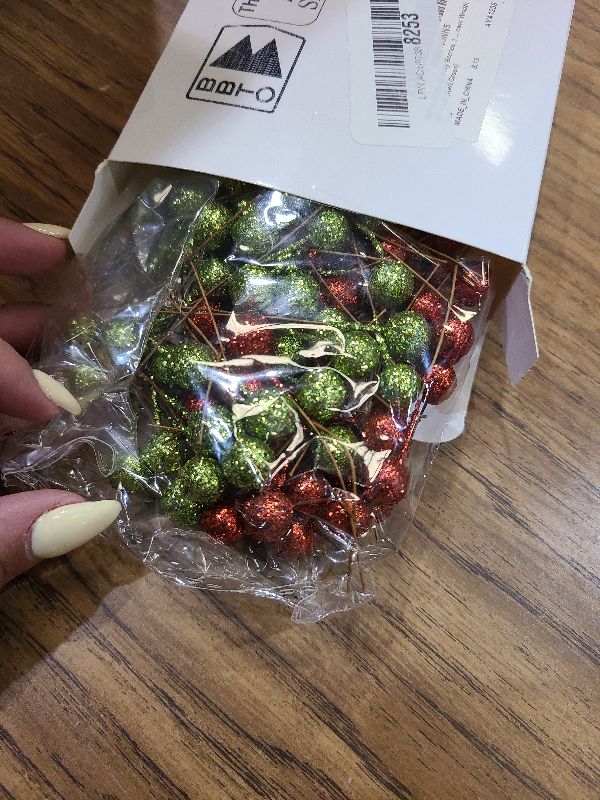 Photo 1 of BBTO 100 Pack Artificial Holly Berries Mini 10 mm Christmas Fake Berries Stems Crafts Faux on Wire for Christmas Tree Decoration Flower Branches Ornament Wreath DIY Winter Home (Glitter Red and Green)