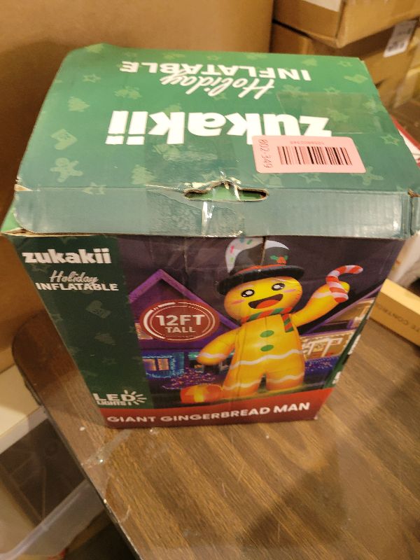 Photo 1 of 12FT Giant Christmas Inflatables Gingerbread Man Built-in Bright LED Light, Huge Christmas Decorations Outdoor Hold Candy Cane & Gift Large Christmas Blow Up Yard Decoration for Xmas Holiday Party