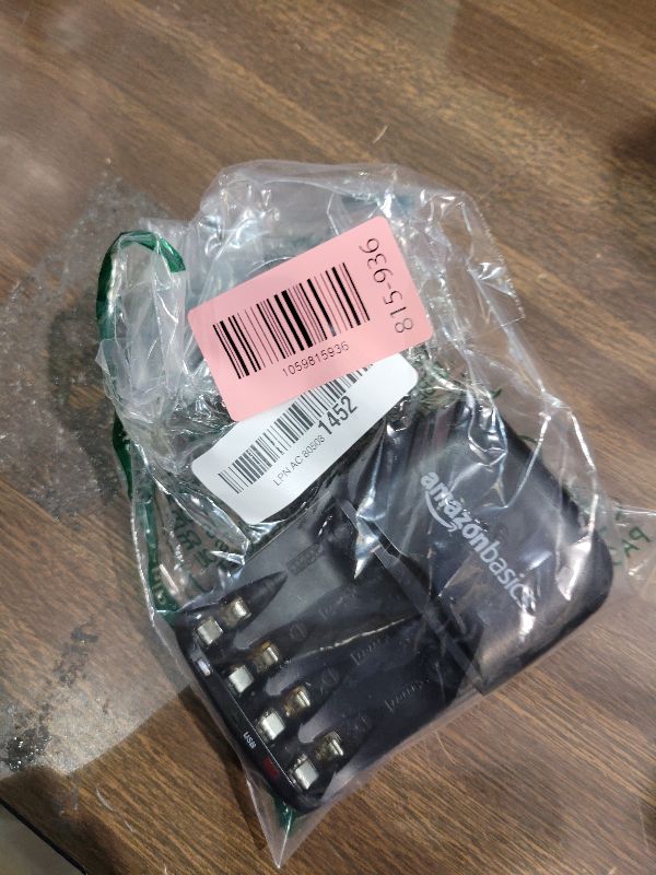 Photo 1 of Amazon Basics Rechargeable Battery Charger for AA & AAA Nickel-Metal Hydride (NiMH) Batteries with USB Charging Port, Black