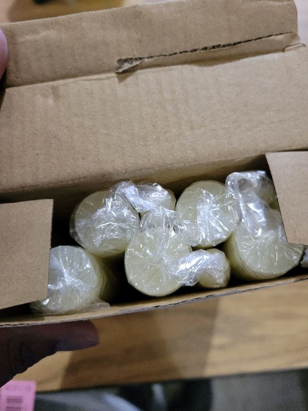 Photo 1 of 12 Pack Ivory Taper Candles 10 inch - Taper Candles Dripless, Smokeless, Unscented - 8 Hours Long Burning - Hand Poured Tall Candlesticks - Perfect for Home Decor, Weddings, and Special Occasions