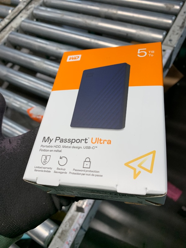 Photo 1 of ***HEAVILY USED***
WD 5TB My Passport Ultra, Blue, Portable External Hard Drive, backup software with defense against ransomware, and password protection, USB-C and USB 3.1 - WDBFTM0050BBL-WESN