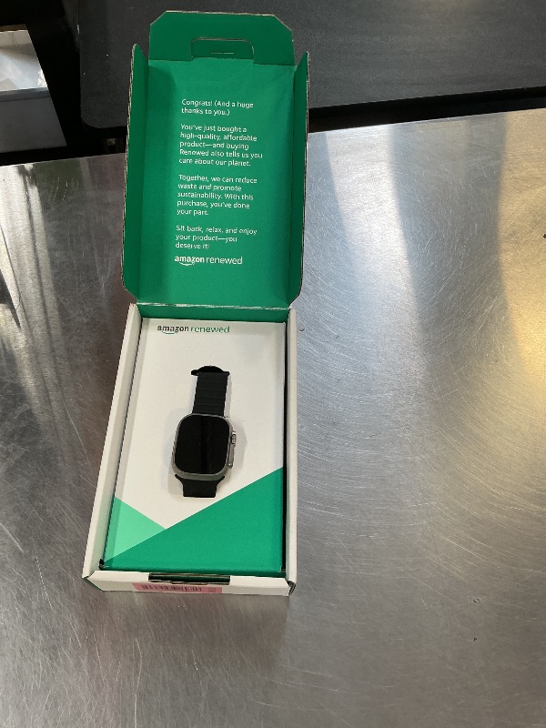 Photo 1 of Apple Watch Ultra [GPS + Cellular 49mm] Titanium Case with Midnight Ocean Band, One Size (Renewed Premium)