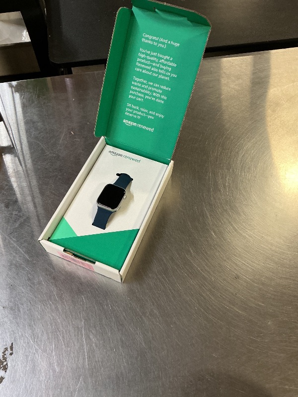 Photo 1 of Apple Watch Series 9 [GPS 45mm] Silver Aluminum Case with Storm Blue Sport Band S/M (Renewed Premium)