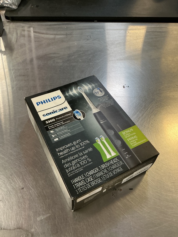 Photo 1 of Philips Sonicare ProtectiveClean 5300 Rechargeable Electric Toothbrush, with Pressure Sensor, 3 Cleaning Modes, SmarTimer and QuadPacer, with 2 Bonus Brush Heads, Travel Case, Black, Model HX6423/34