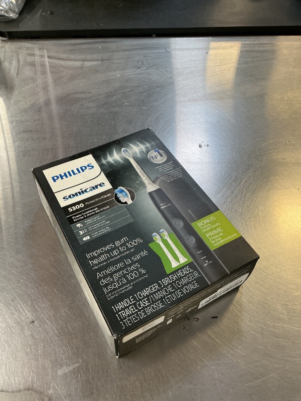 Photo 1 of Philips Sonicare ProtectiveClean 5300 Rechargeable Electric Toothbrush, with Pressure Sensor, 3 Cleaning Modes, SmarTimer and QuadPacer, with 2 Bonus Brush Heads, Travel Case, Black, Model HX6423/34