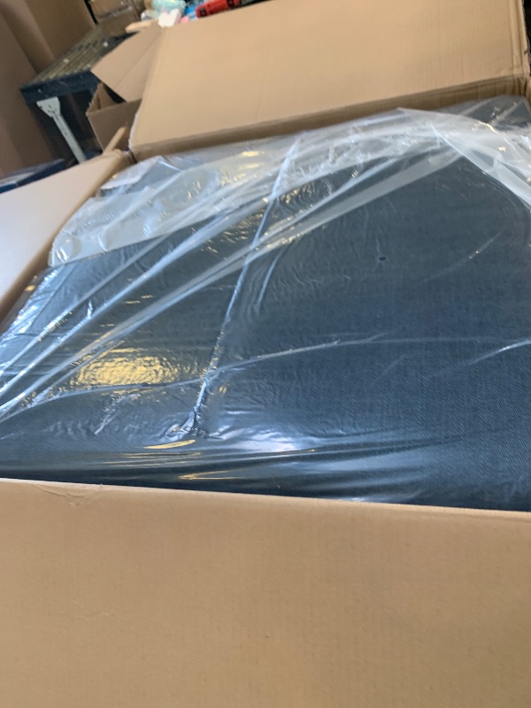 Photo 1 of Signature Design by Ashley Modmax Contemporary Stain Resistant Square Oversized Accent Ottoman with Non-Skid Legs, Blue