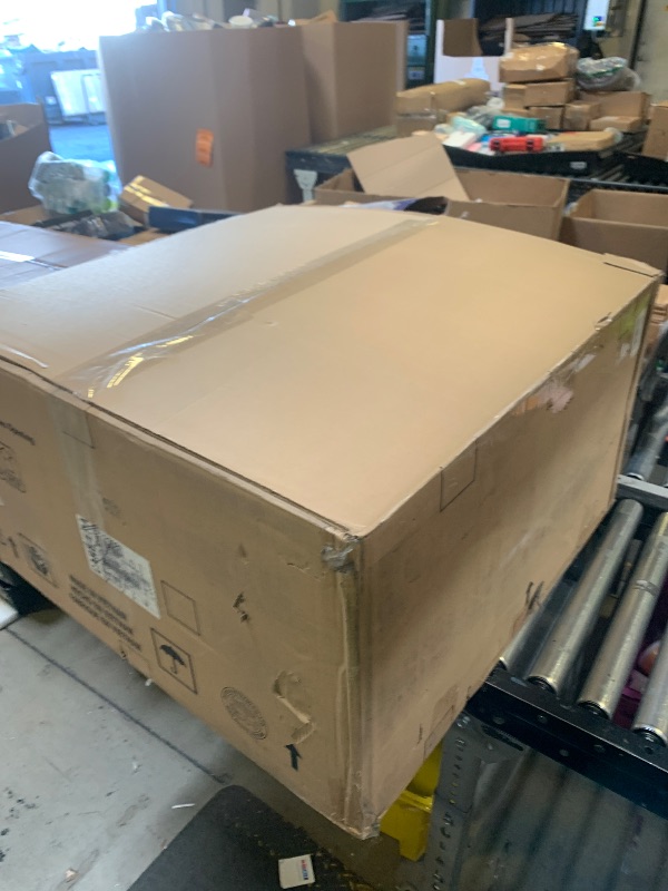 Photo 1 of Signature Design by Ashley Modmax Contemporary Stain Resistant Square Oversized Accent Ottoman with Non-Skid Legs, Blue