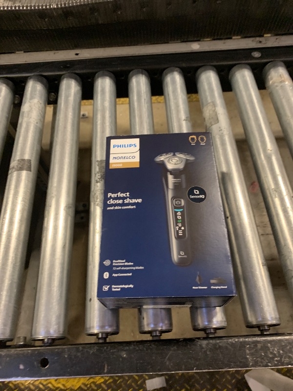 Photo 1 of Philips Norelco Shaver i9000, Wet & Dry Electric Shaver, Ink Black, SenseIQ Technology, Triple Lift & Cut System, 360 Rotating Dual SteelPrecision Precision Blades, Nose Trimmer, Model X9000/90