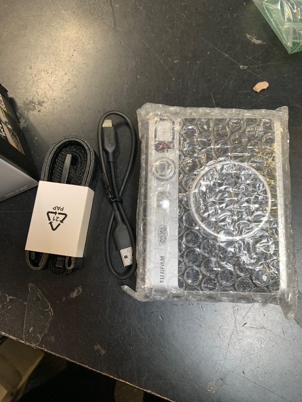 Photo 1 of Fujifilm Instax Mini EVO Instant Camera